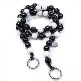 upbeads midi salt n' pepper crossbody kids holzperlenkette wooden beads chain cellphone chain keychain schwarz weiß black and white handmade made in germany