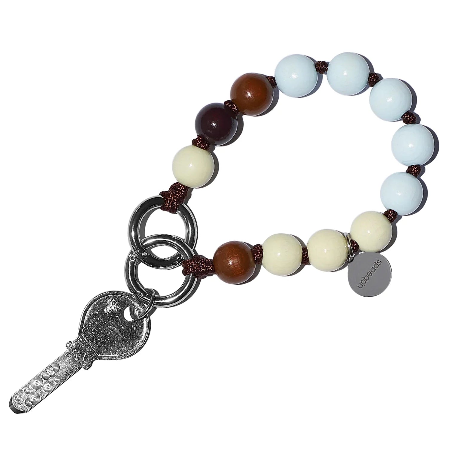 Beaded Vanilla Bean Mini upbeads bracelet with a key charm on a white background