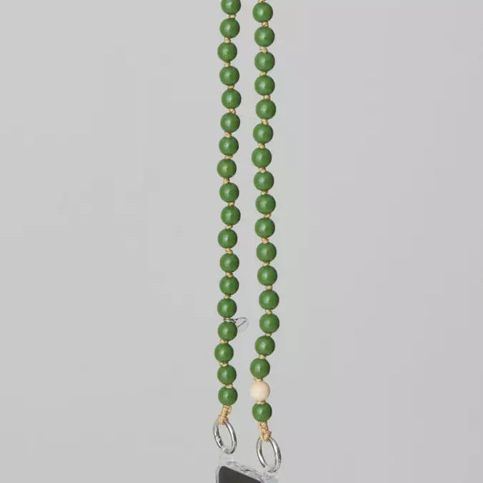 close up upbeads cellphone chain on white background beads are made of sustainable wood beads nontoxic coloring attached to a cellphone case with rings to use as a crossbody chain around your body