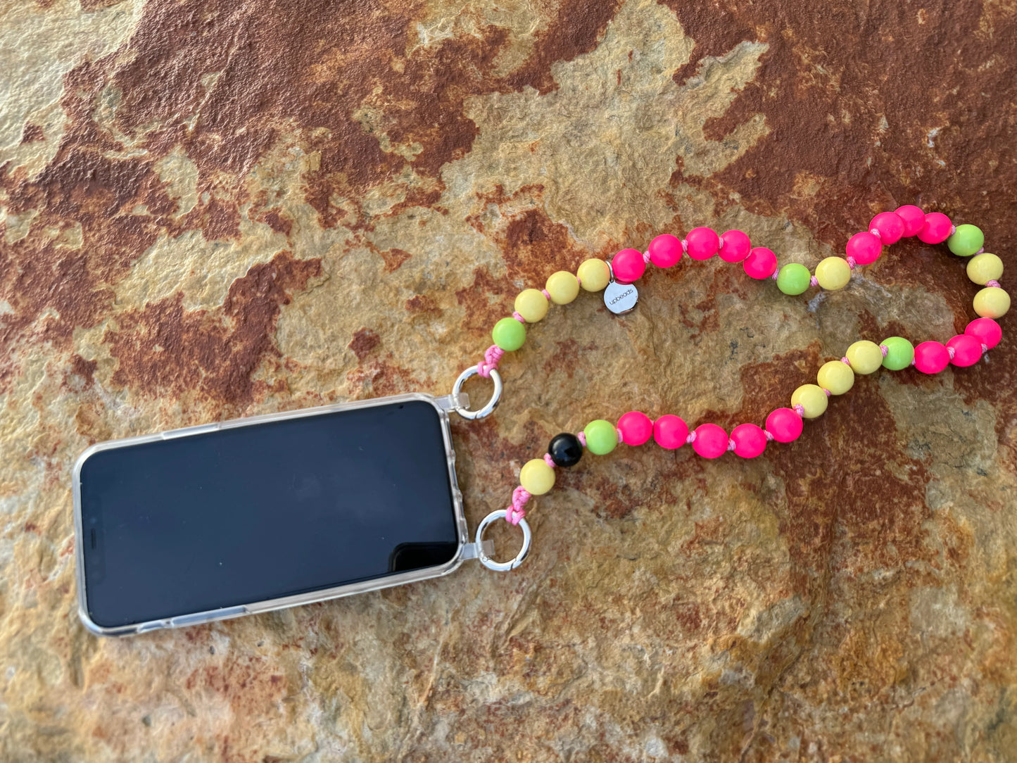Flashdance Shortie on a rock flashy neon pink wooden beads with lime green and yellow beads with black signature bead
