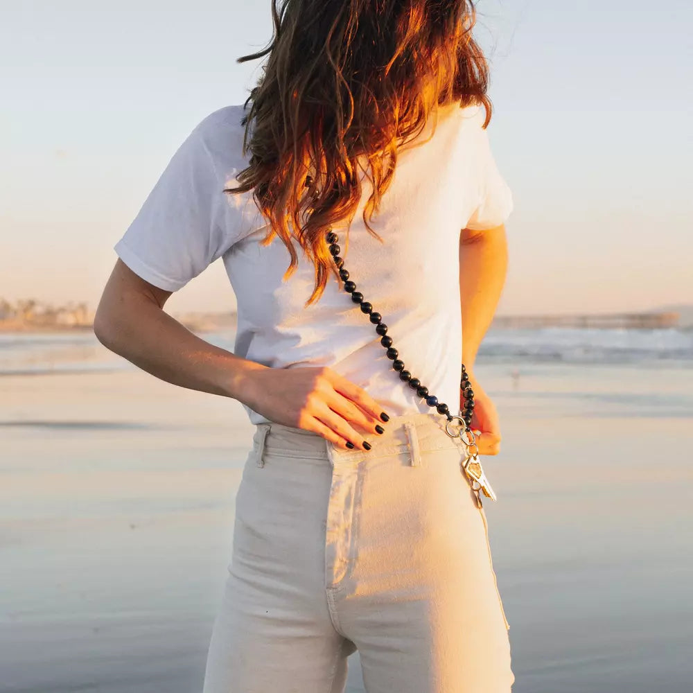 NIGHTSHIFT cell phone chain CROSSBODY UPBEADS worn by model in LA beach