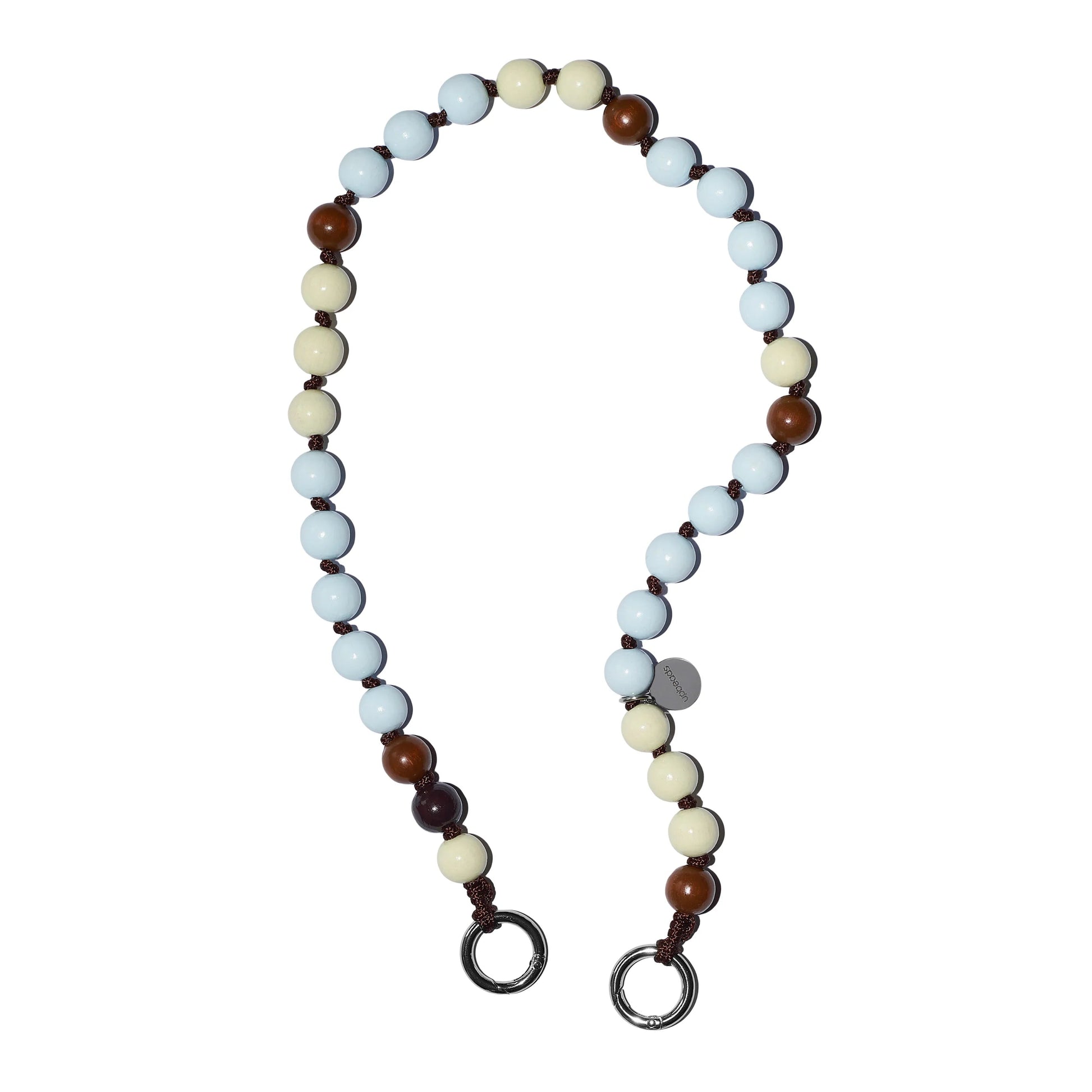 vanilla bean shortie 60cm light blue, creme white brown wooden beads on light background