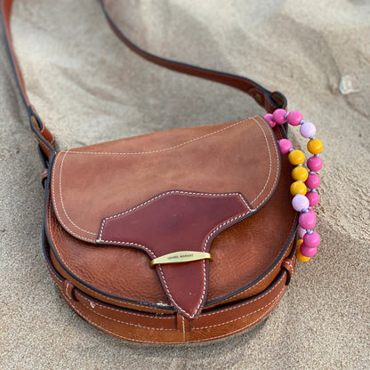 upbeads candy shortie is inside an Isabel Marrant brown bag on the beads
