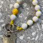 LAVAN YELLOW MINI PENDANT MINI UPBEADS on marble