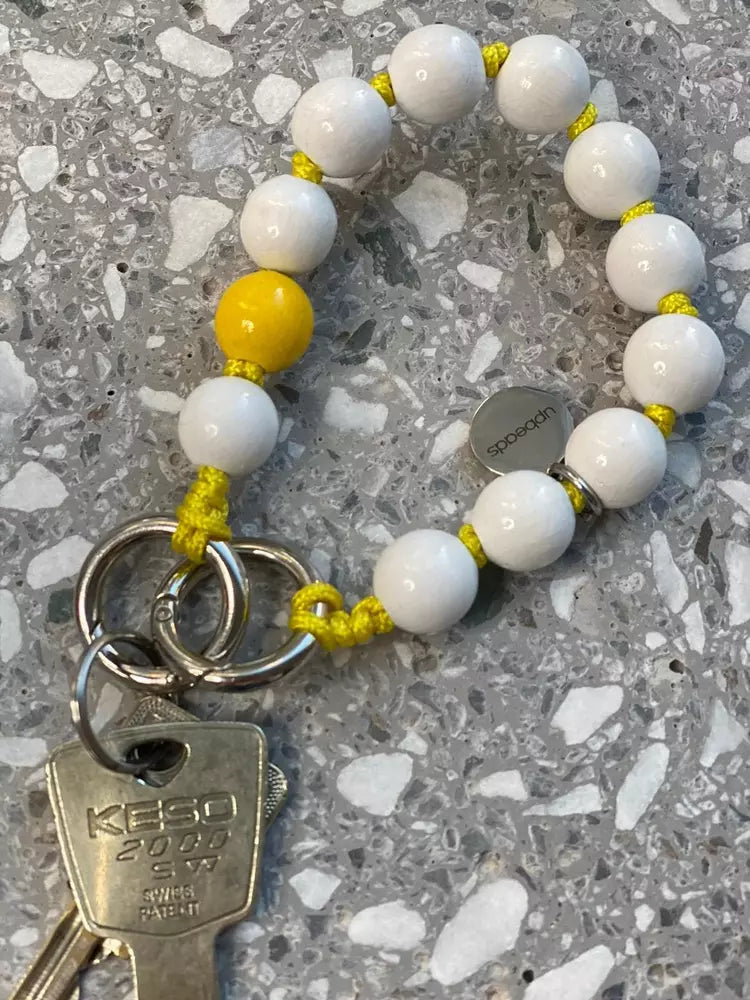 LAVAN YELLOW MINI PENDANT MINI UPBEADS on marble
