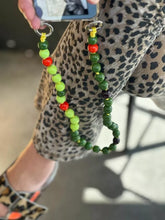 Load image into Gallery viewer, sue blond holding a shortie upbeads wooden bead chain green and orange lime combination