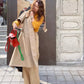 woman in south korea holding her upbeads crossbody cell phone chain handmade in germany wooden beads