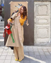 Laden Sie das Bild in den Galerie-Viewer, woman in south korea holding her upbeads crossbody cell phone chain handmade in germany wooden beads
