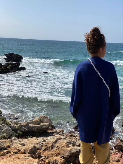 lavan blue blau crossbody upbeads ocean beach waves girl watching waves wearing upbeads lavan blue
