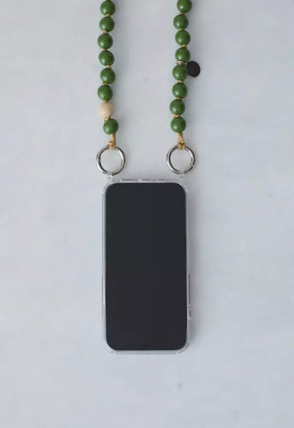 close up upbeads cellphone chain on white background beads are made of sustainable wood beads nontoxic coloring attached to a cellphone case with rings to use as a crossbody chain around your body