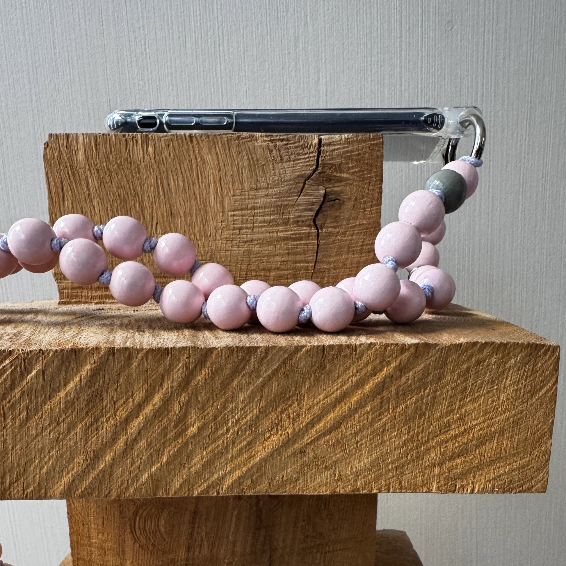 upbeads blush pastel light pink attached to iphone case 